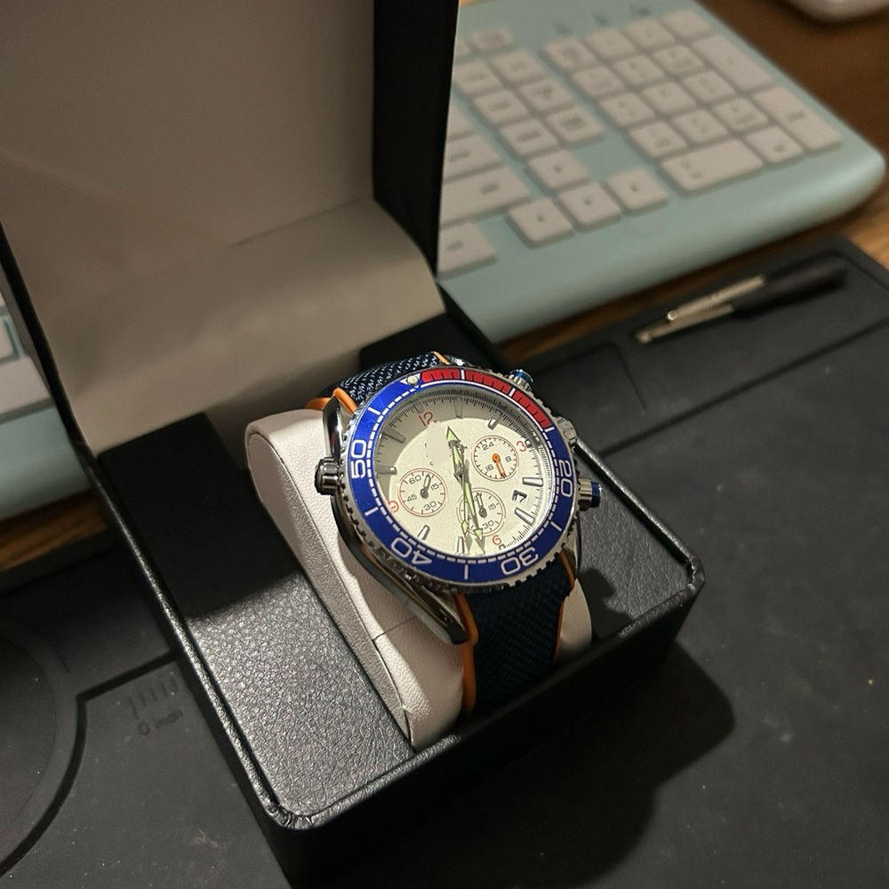 Men's Blue and Silver Watch